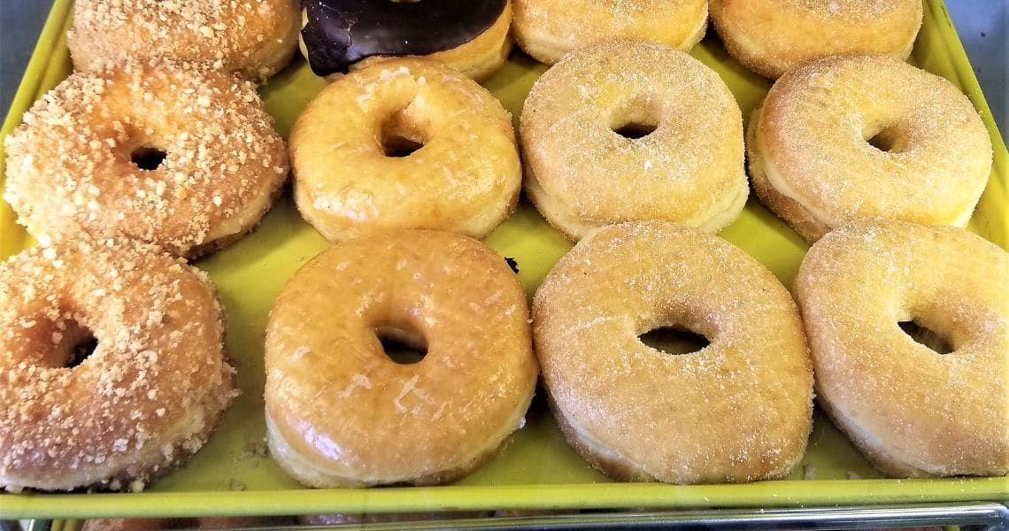 assorted donuts on a tray