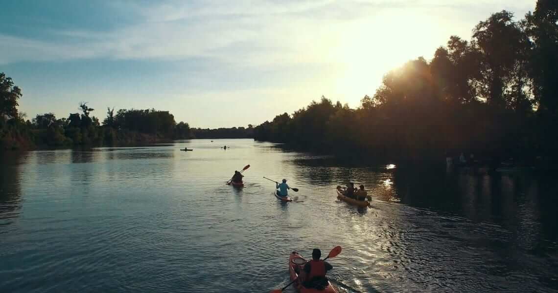 kayaking spots and rentals in matagorda bay-group kayaking on river-3