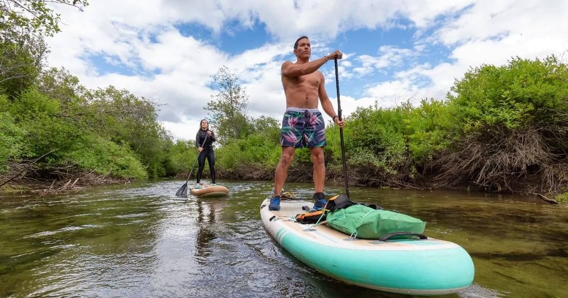 local guide to paddleboarding in palacios-couple paddle boarding-5