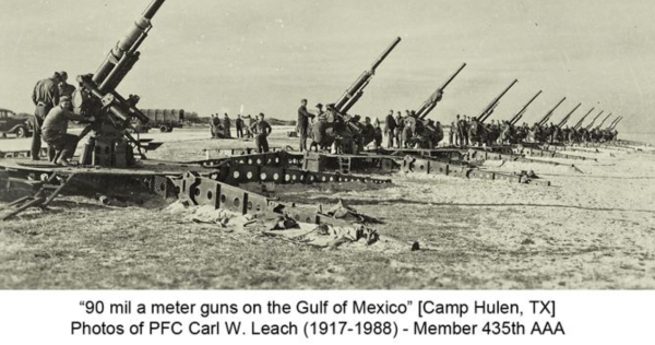 camp hulen in palacios, texas-cannons-3 A black-and-white photograph showing a long line of large anti-aircraft guns positioned on the Gulf of Mexico at Camp Hulen, Texas. The guns are spaced evenly across the beach, with soldiers gathered around each one, preparing for or conducting an exercise. The image highlights the size and scale of the artillery, with several of the guns pointed skyward. The caption at the bottom reads, "90 millimeter guns on the Gulf of Mexico" along with a dedication to PFC Carl W. Leach, a member of the 435th AAA, and includes his years of life (1917-1988).